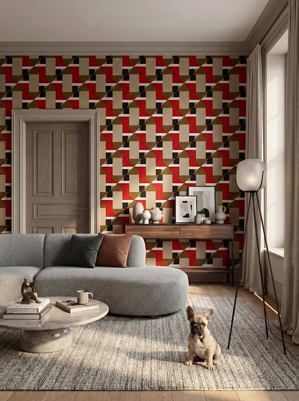 Living room with geometric patterned wall, gray sofa, and a dog sitting on the floor.