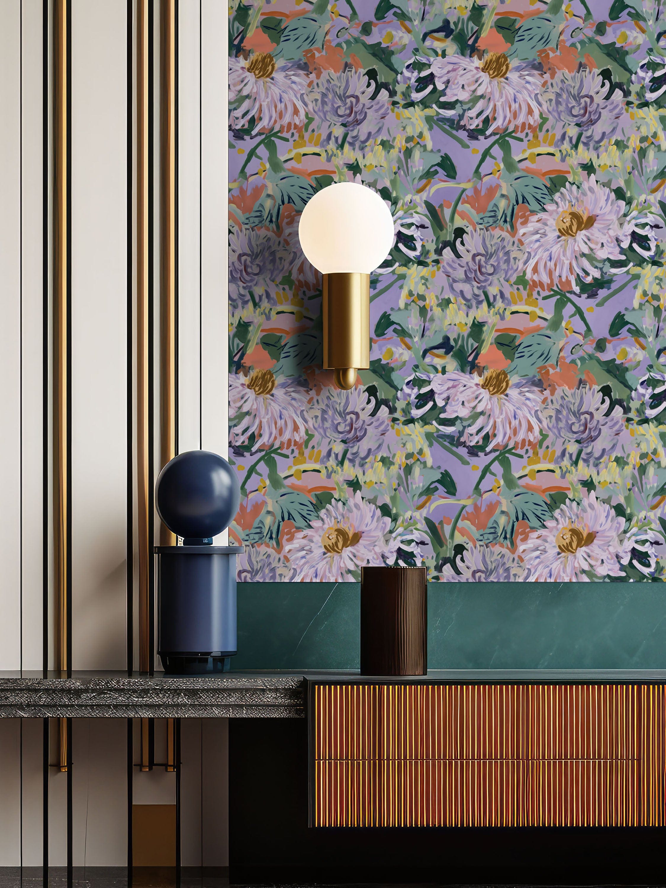 Purple and green floral wallpaper with chrysanthemum-style blooms, styled in a contemporary interior with a brass wall light, dark wood cabinetry, and marble countertop.