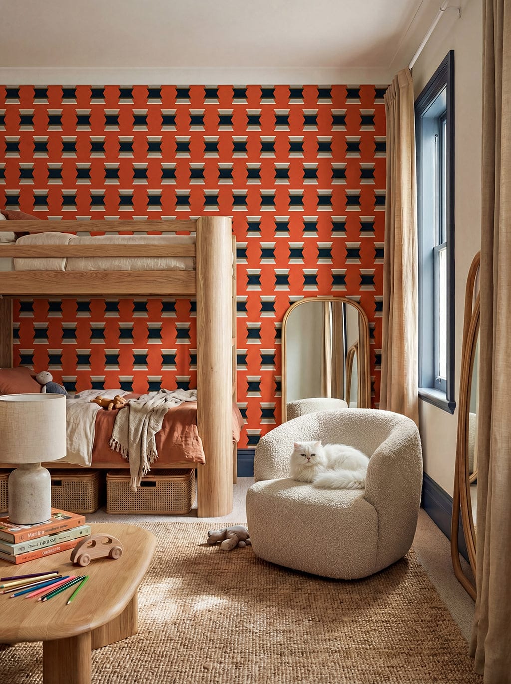 Children's room with geometric orange and black wallpaper, white armchair, and wooden bunk bed.