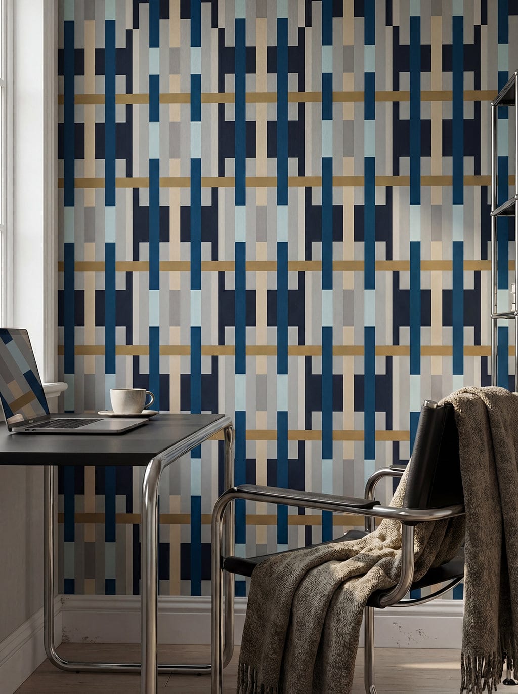 Modern room with geometric patterned wallpaper, chair, and desk.