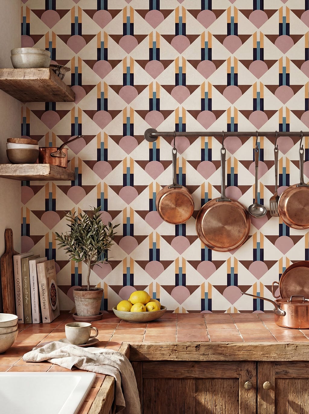 Kitchen with geometric patterned wallpaper and copper pots.