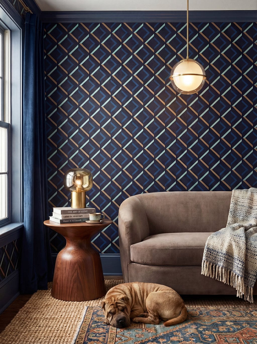 Cozy living room with a dog resting on the floor, a brown armchair, and decorative wall patterns.