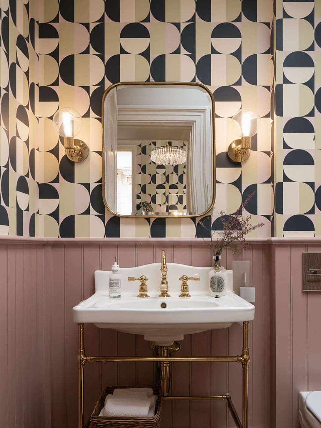 Bathroom with geometric wallpaper, mirror, and sink.