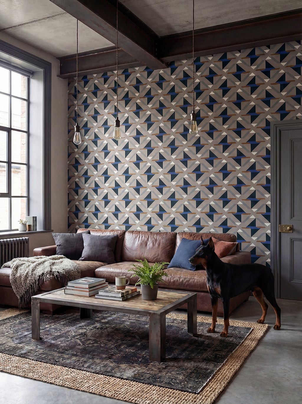 Living room with patterned wall, brown sofa, and rug.