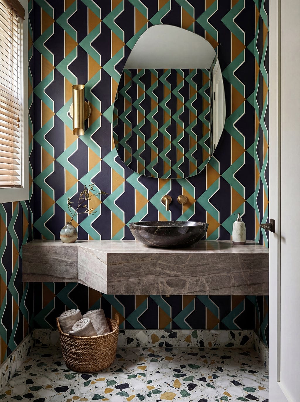 Bathroom with geometric patterned wallpaper, marble countertop, and decorative elements.